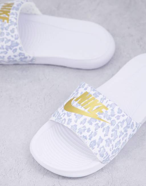 Nike slides shop gold swoosh