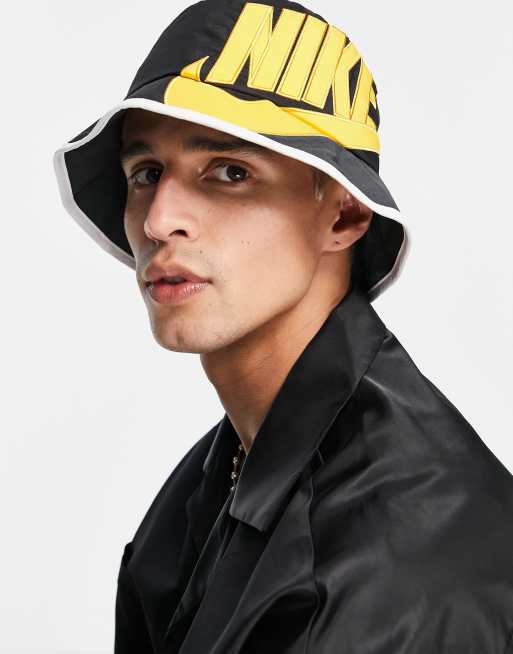 Nike Vintage Futura logo bucket hat in black and gold ASOS