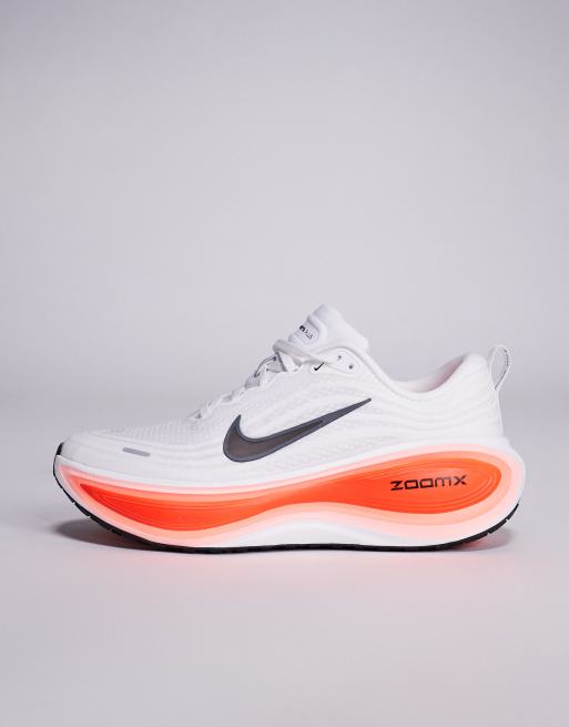 Nike Vomero Plus running sneakers in white & pink