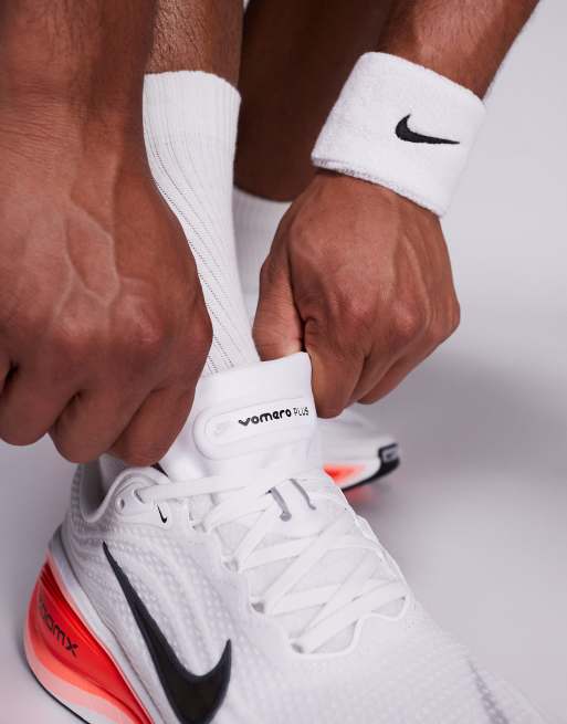 Nike Vomero Plus running sneakers in white & pink