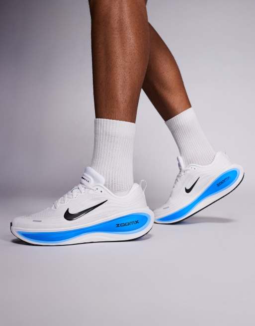 Nike Vomero Plus sneakers in white and blue