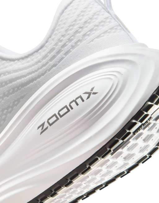 Nike Vomero Plus sneakers in white and metallic gray, 3 of 4