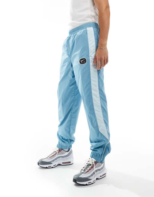 Nike - Vævede og lyseblå joggingbukser med Swoosh Air-logo