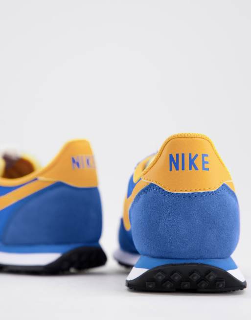 Nike blue hot sale yellow trainers