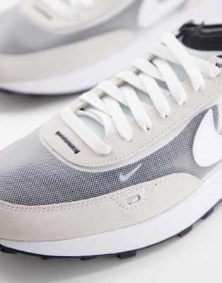 white nike mesh trainers