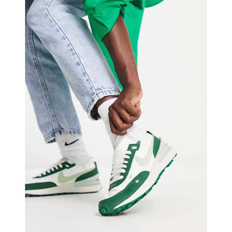 Green and store white trainers