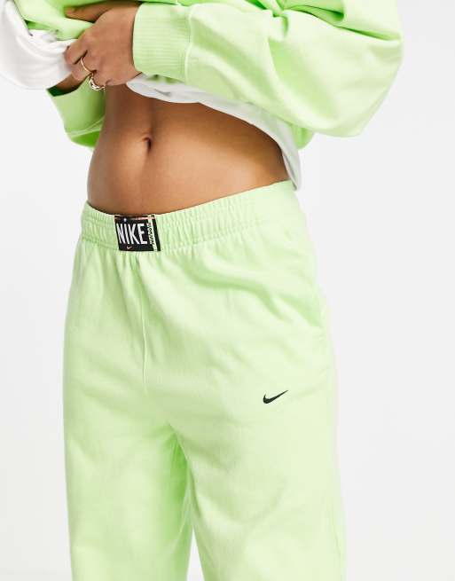 Nike washed high rise joggers in neon green ASOS