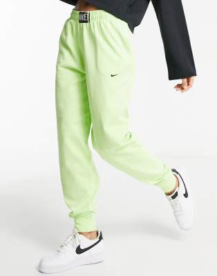 nike green track pants