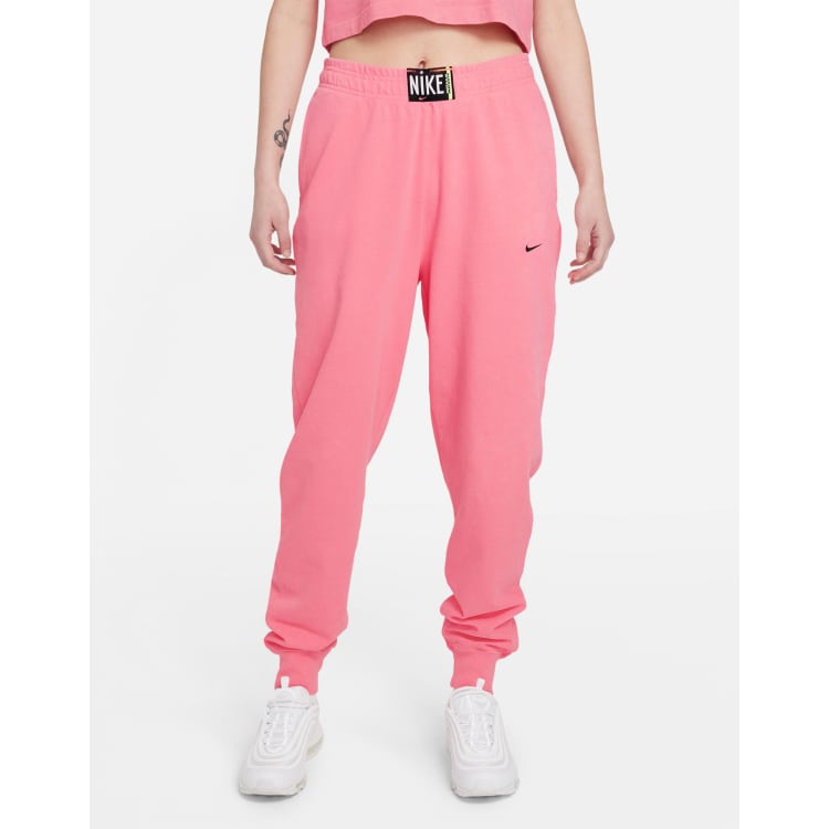 Nike washed high rise sweatpants in neon pink