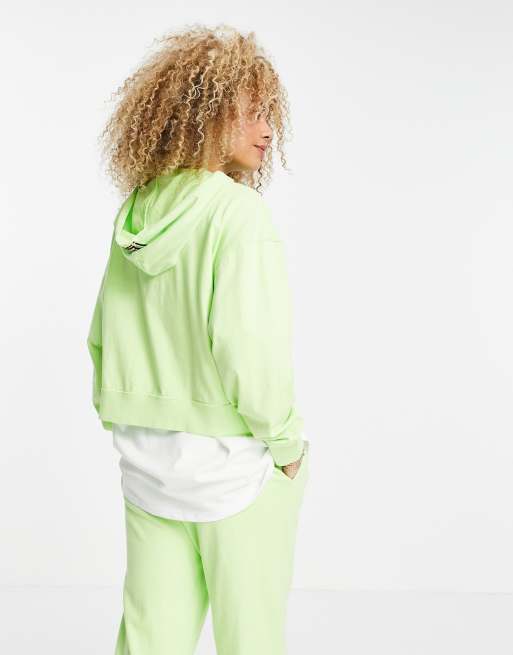 Nike washed hoodie in neon green ASOS