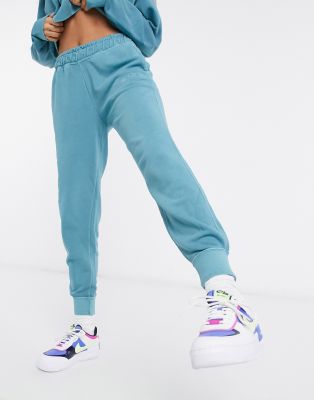 turquoise nike sweatpants