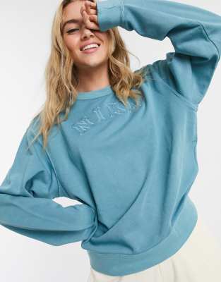 washed blue sweatshirt