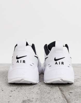 nike white and black air heights sneakers