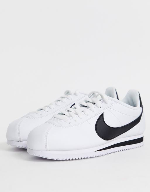 Nike cortez leather trainers in white 2025 with black swoosh