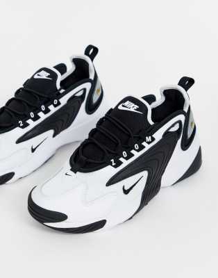 white and black zoom 2k trainers