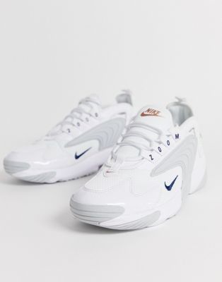 white nike with rose gold swoosh