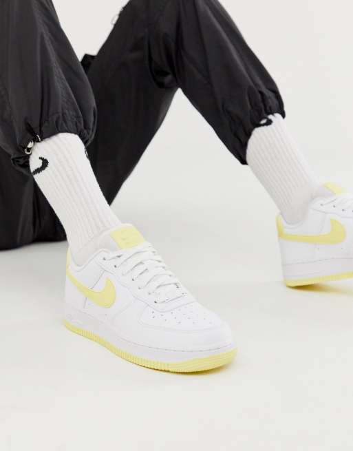 Nike yellow hotsell and white shoes