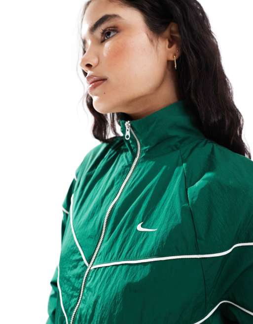 Nike Windrunner jacket in gorge green with cream chevron piping