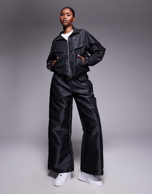 Nike - Windrunner Liquide Shine - Trainingsjack en -broek in zwart