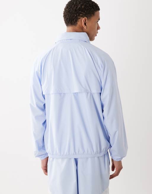 Nike – Windrunner – Niebieska lekka kurtka z zamkiem pod szyją , 5 z 5