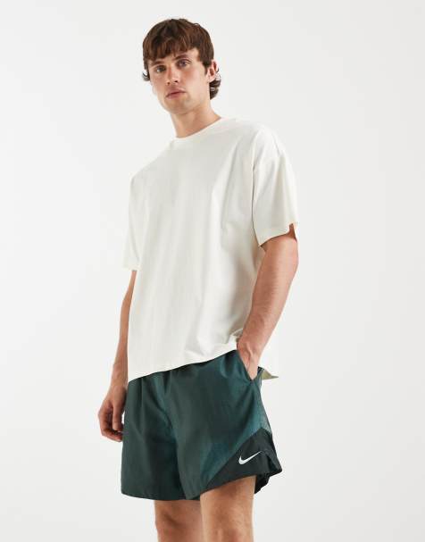 Nike Windrunner shorts in dark green