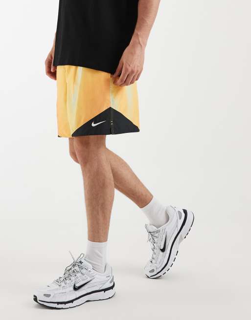 Nike Windrunner shorts in orange, 4 of 5