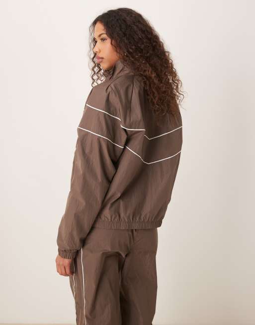 訳あり超特価の通販 Nike windrunner track jacket in brown | ASOS トップス