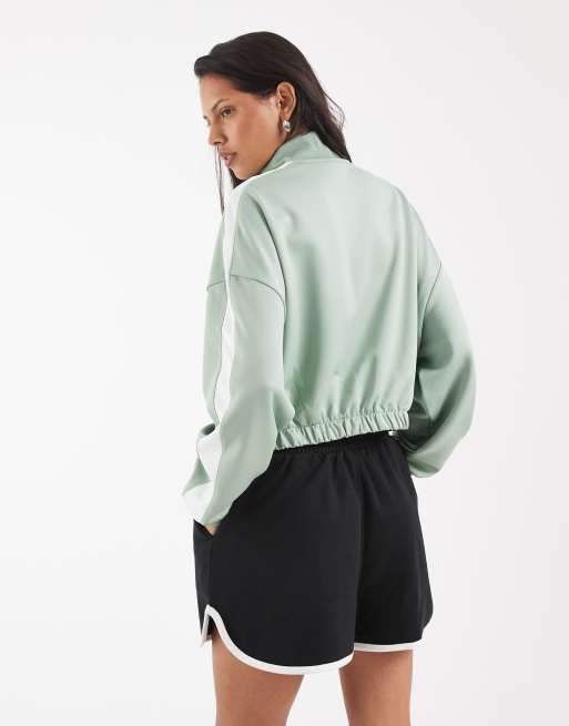 Nike Windrunner track jacket in light green , 3 of 4