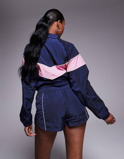 Nike Windrunner woven 2 inch shorts in navy, 4 of 5