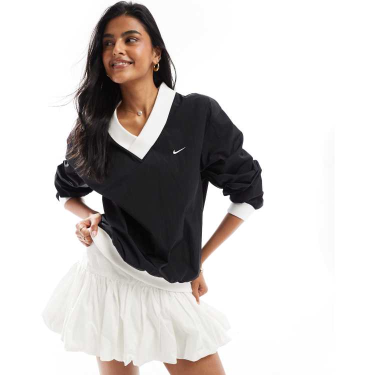 Nike Windrunner woven long sleeve crew neck top in black
