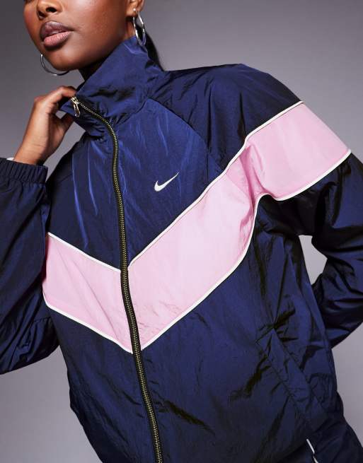 Nike ジップアップ ウィンドブレーカー ネイビー/ピンク Nike Windrunner woven track jacket in navy and pink | ASOS