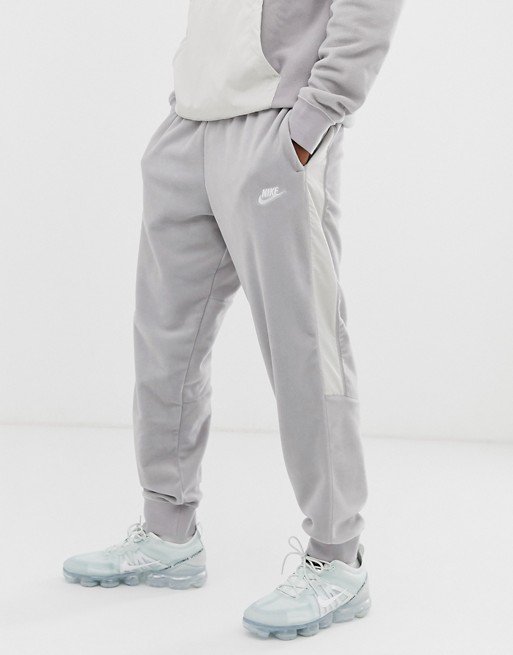Nike winter cuffed joggers with nylon panels in grey