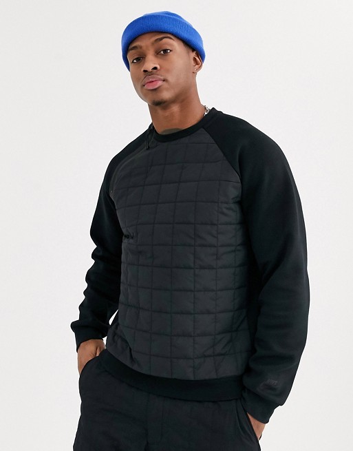 Nike winter quilted panel crew neck sweat with asymmetric zip detail in black