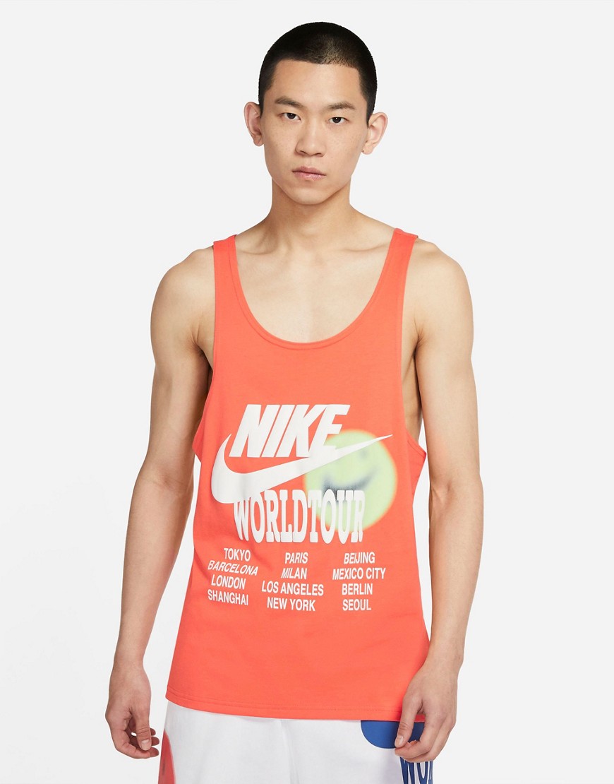 Nike World Tour Pack graphic print tank top in dusty orange