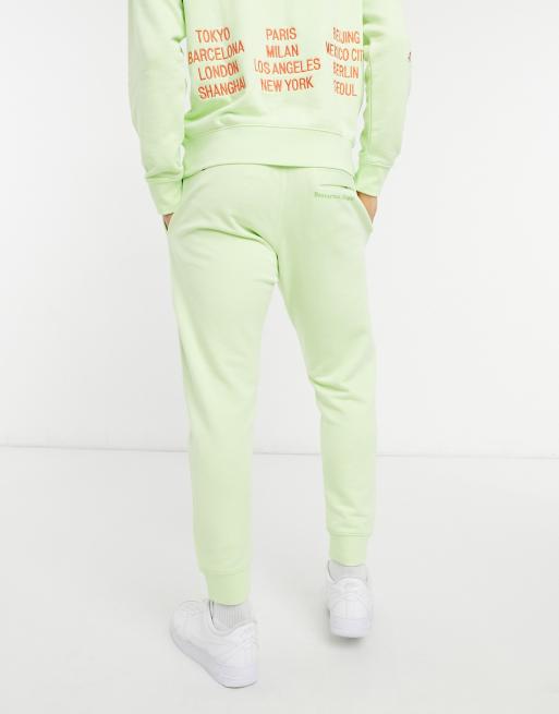 Nike World Tour Pack Joggers verde lime con fondo