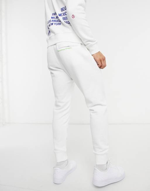 Nike - World Tour Pack - Joggingbroek met grafische print en boorden in wit , 2 van 4