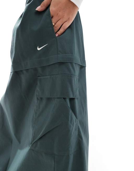 Nike Woven 2 in 1 maxi and mini skirt with zip detail in green