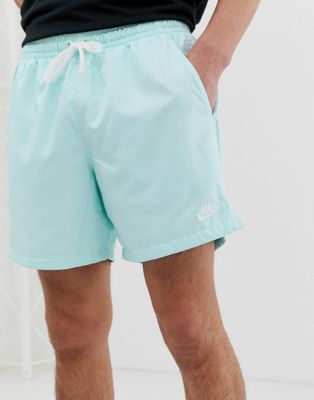 nike woven shorts turquoise