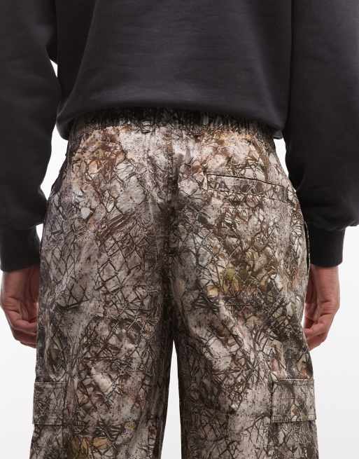 Nike woven pants in khaki camo print , 5 of 5