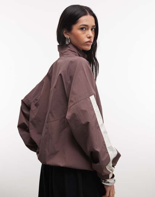 Nike woven running jacket in brown | ASOS