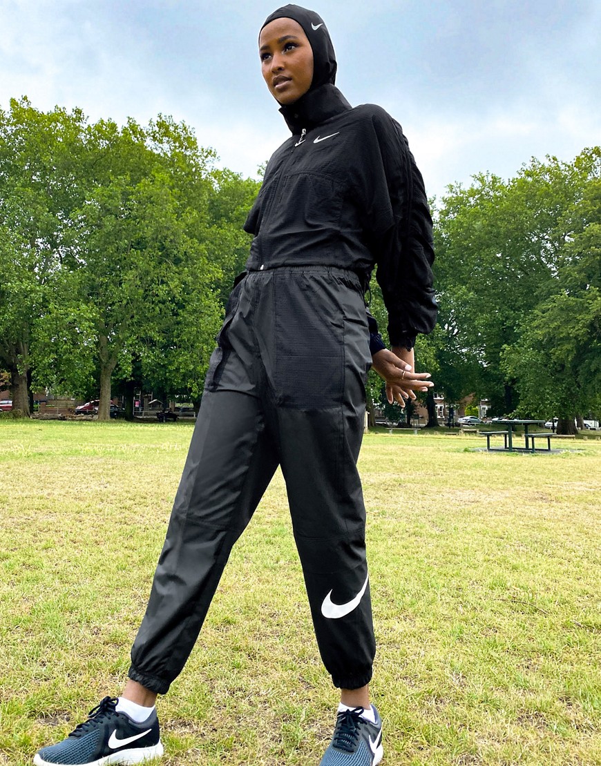 Nike woven swoosh cargo pants with belt in black