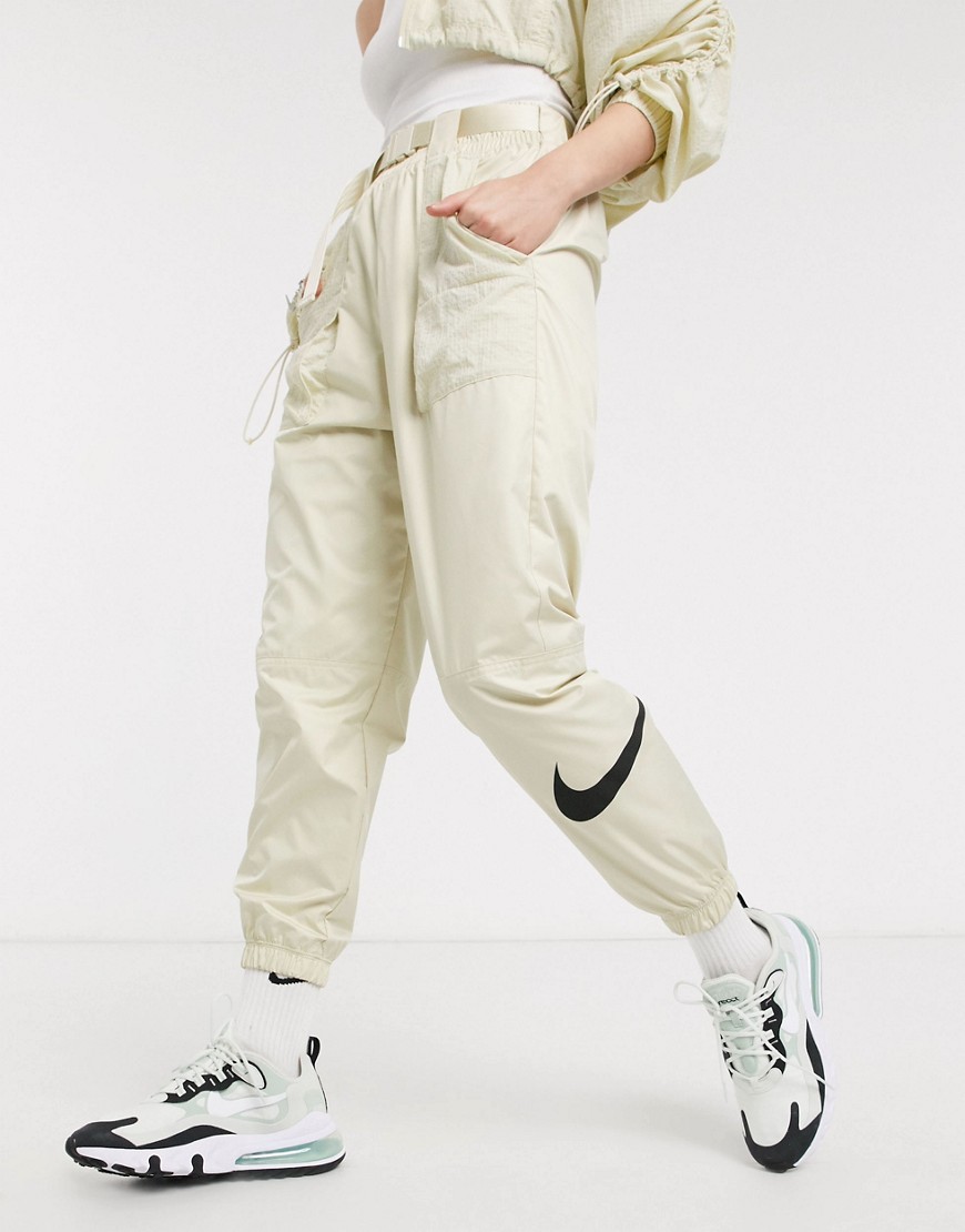 Nike woven swoosh cargo pants with belt in off white-Vit
