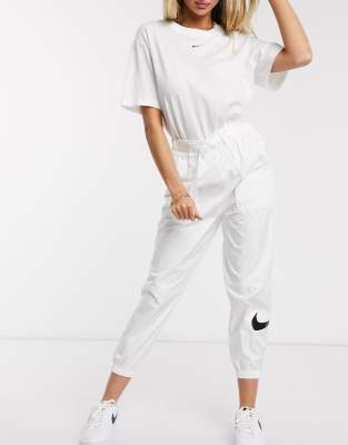 nike woven swoosh pants