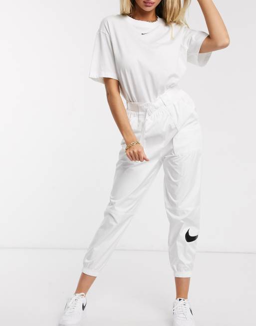 swoosh cargo pants with belt in off white |