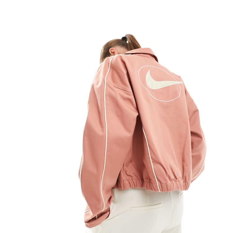 Nike woven track jacket in Terra Blush ASOS