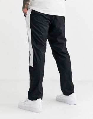 Nike Woven Track Pant in black | ASOS