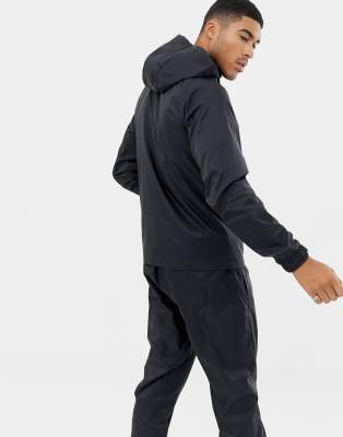 nike woven tracksuit mens