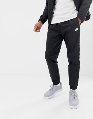 nike black woven tracksuit