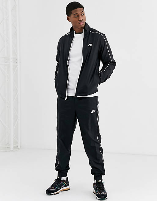 Nike woven tracksuit set in black