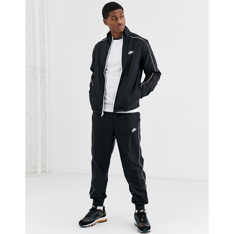 Nike woven tracksuit set in black ASOS